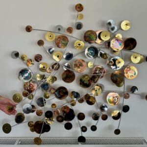Curtis Jere wall hanging sculpture mixed metal discs molecular celestial contemporary installation